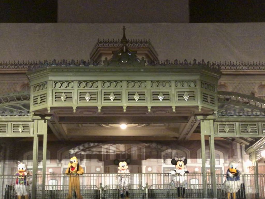 Mickey and Friends waving at Disney's Magic Kingdom